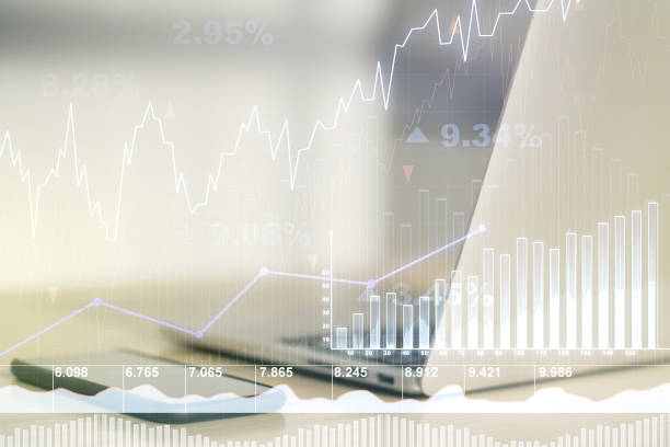 istock Abstract creative financial graph on modern laptop background, forex and investment concept. Multiexposure 1350397882