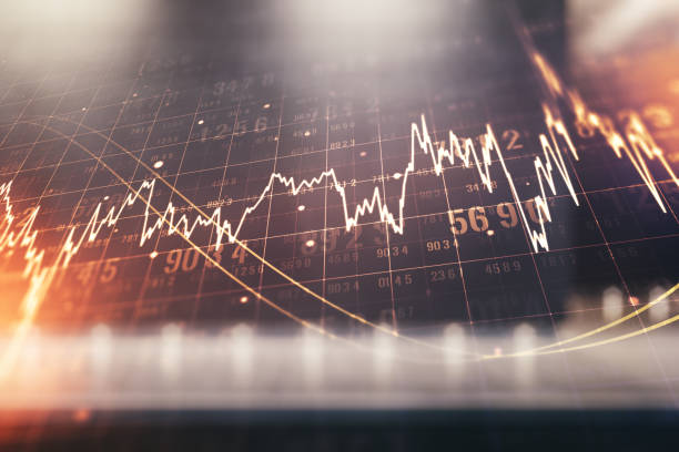 istock Abstract virtual financial graph hologram on blurry modern office building background, forex and investment concept. Multiexposure 1350398043