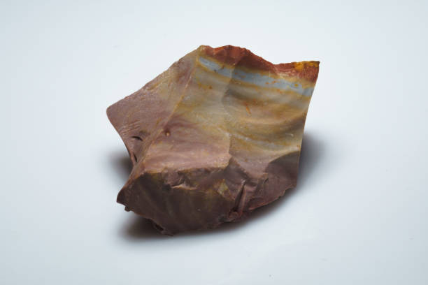 istock natural jasper mukaite ore on the background 1350402987