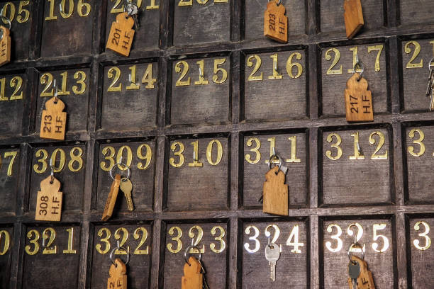 istock Wall at hotel reception with numbered keys hanging on hooks 1350404878