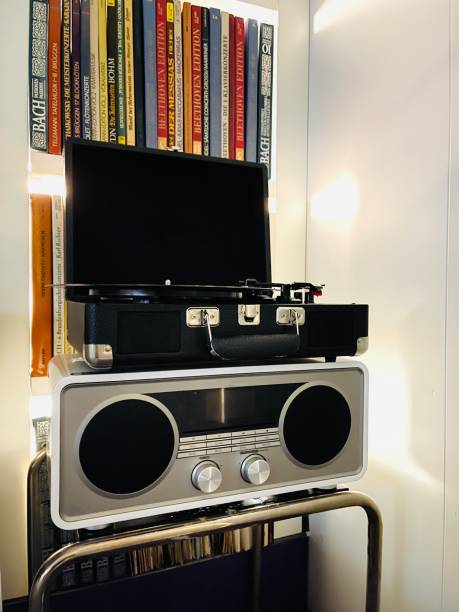 istock Vinyl records turntable and vinyl records collection in background 1350404882