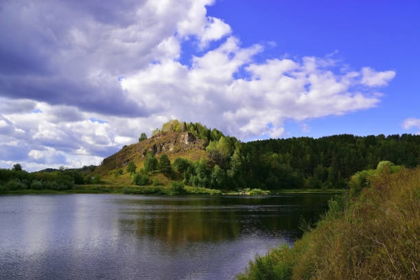 Rock outcrop Kamen Lobach Rock outcrop Kamen Lobach on the right slope of the Sylva river valley. Tourist site in the Kishert district of the Perm region. big blue crane stock pictures, royalty-free photos & images