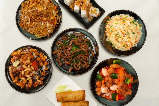 Table with typical Chinese food as seen from above