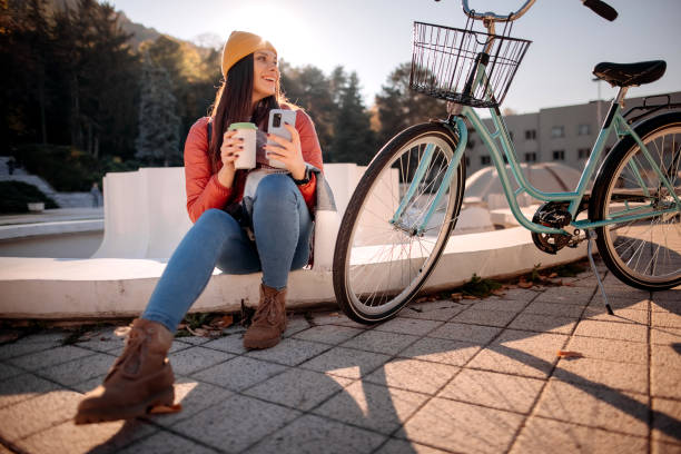 istock Attractive woman taking a coffee break 1350411572