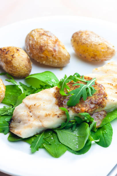 istock grilled carp with mustard sauce and grilled potatoes 1350412606