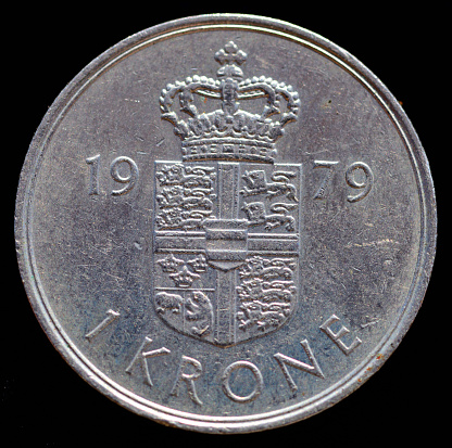 1968 Denmark 1 Kroner coin reverse side featuring crowned and quartered arms of Denmark divide date, value above, Lettering: 1 KRONER\nCopper Nickel