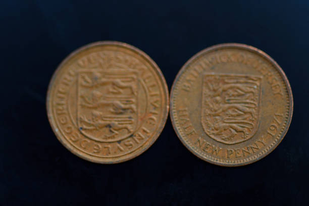 istock Guernsey and Jersey half pennies 1350415786