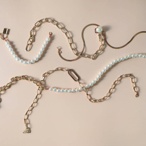 istock Women's jewelry and other stuff on a neutral background 1350416735