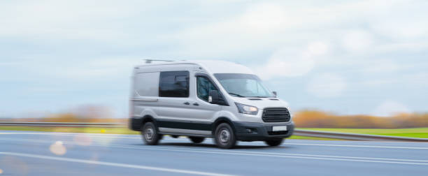 istock The minibus goes on a suburban highway 1350417474