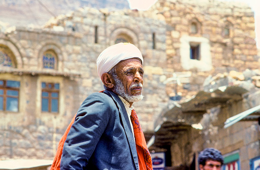 Sanaa, Yemen - June 30, 1991: portrait of old senior man with the typical yemenite dress, The turban and the neck scarf in Sanaa, Yemen,