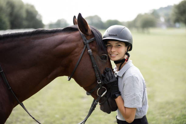 istock Horsewoman and Thoroughbred 1350421418