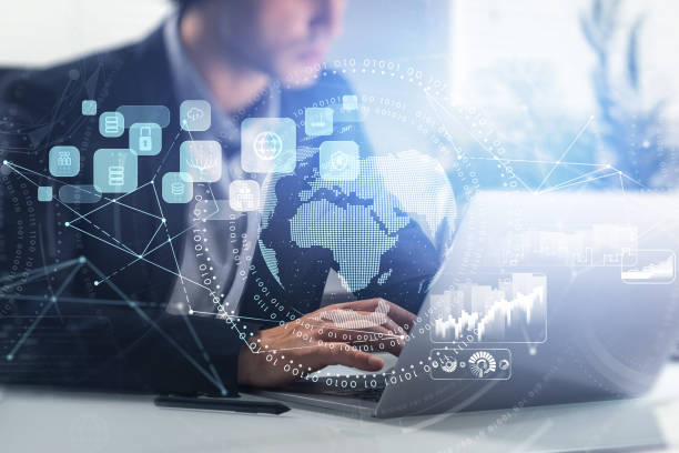 istock Businessman is typing message on laptop with digital interface 1350422798