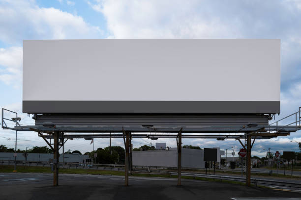 istock Super size white rectangular advertising billboard on the street at the highway entrance in Boston, Massachusetts. 1350422983