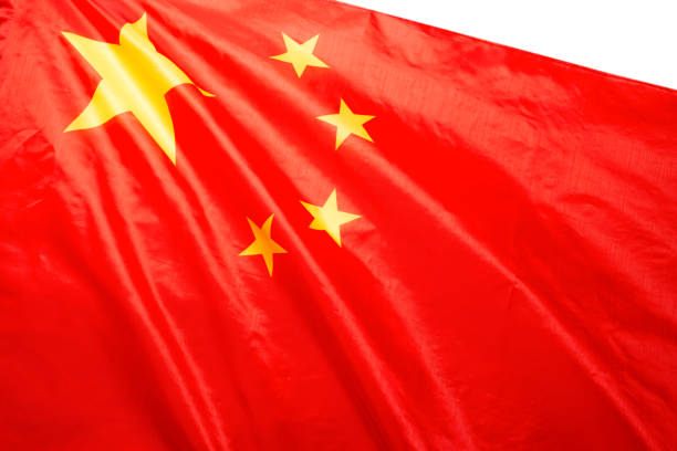 istock China flag waving as a background. 1350428556