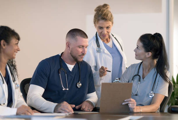 istock Medical Students Discussing Patient Cases 1350428603