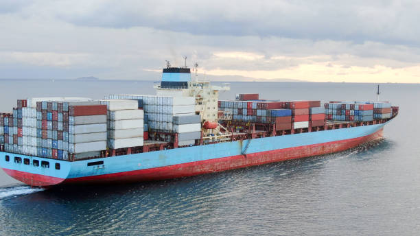 istock Aerial view of freight ship with cargo containers. 1350429448