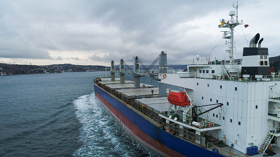 Cargo ship in import export and business logistic, Logistic and transportation of International Container Cargo ship in the open sea, Aerial shot from drone,