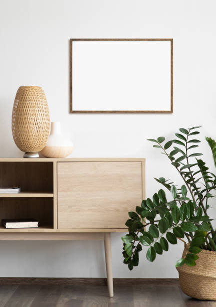 istock Artwork mock-up in interior design. Blank white picture frame on a white wall 1350431034