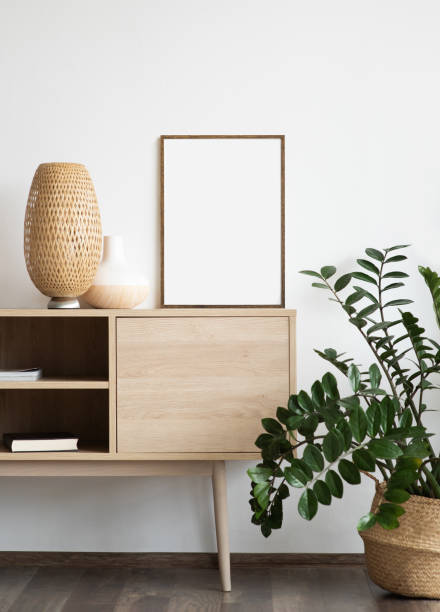 istock Artwork mock-up in interior design. Blank white picture frame on a white wall 1350431059
