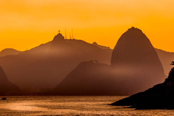 The famous mountains of Corcovado and Sugarloaf viewed from the Guanabara entrance in the Atlantic ocean.