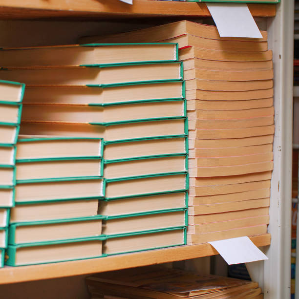 istock Stacks of books on a shelf in the library 1350435257