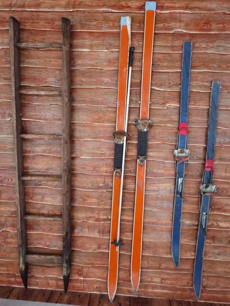 istock skis hung in front of the accommodation wall 1350444173