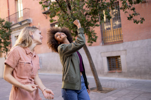 istock Diverse lesbian couple on a vacation in Madrid 1350444813