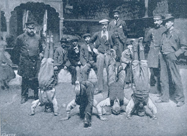 istock East End Fun Upside Down Competition for Cockney Boys and men in 19th Century 1350445493