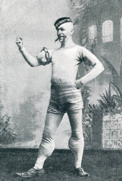 Strong man with exaggerated muscles in circus in 19th century