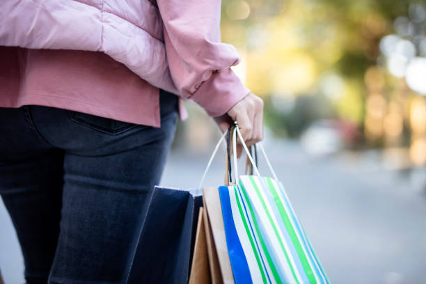 istock Girl with shopping bags 1350445886
