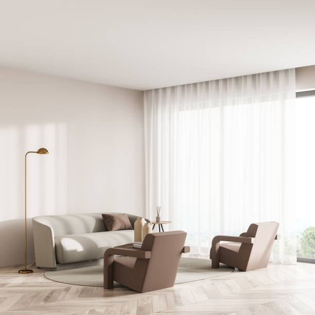 istock Bright living room interior with empty wall, two armchairs, sofa 1350447979