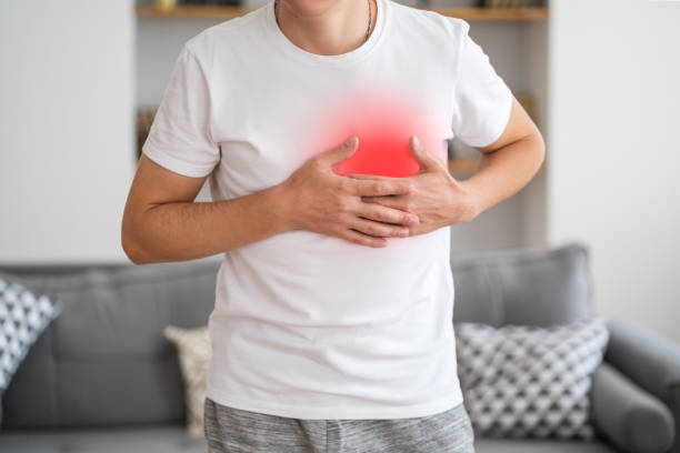 istock Heart attack, man with chest pain suffering at home 1350450764