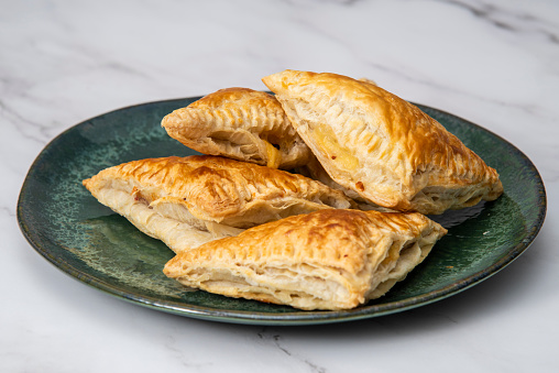 Delicious homemade apple pie on light background.