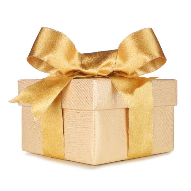 istock Gold gift box wrapped with golden ribbon and bow isolated on white 1350452856