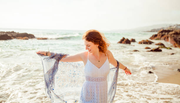 istock Girl on the beach 1350458690