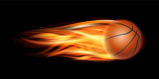 istock Flaming Basketball Ball. Basketball Ball flying in fire on dark background. 1350461925