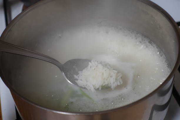 istock Basmati rice  Cooking in a pot of boiling water 1350464034
