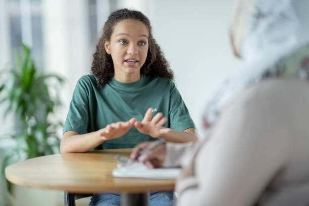 istock Teen in a Therapy session 1350464763
