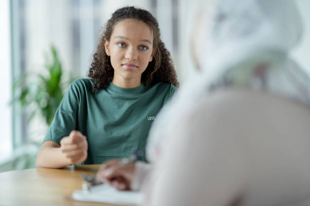 istock Teen in a Therapy session 1350464765