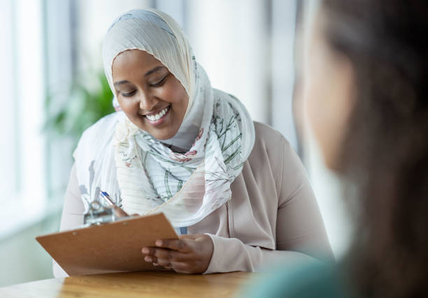 istock Muslim Therapist Smiling During a Therapy Session 1350464769