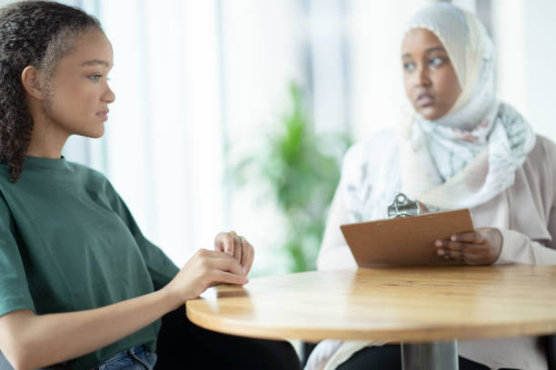 istock Teen Looking Disconnected During Therapy 1350464770