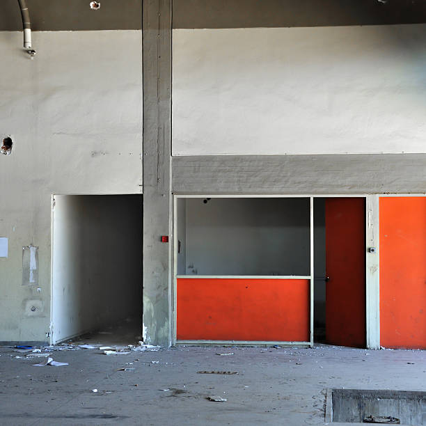 istock concrete wall and empty room in abandoned factory 135046770