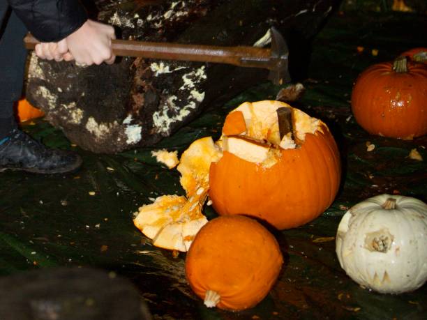 Pumpkin Smashing. Pumpkin Smashing. katt halloween stock pictures, royalty-free photos & images