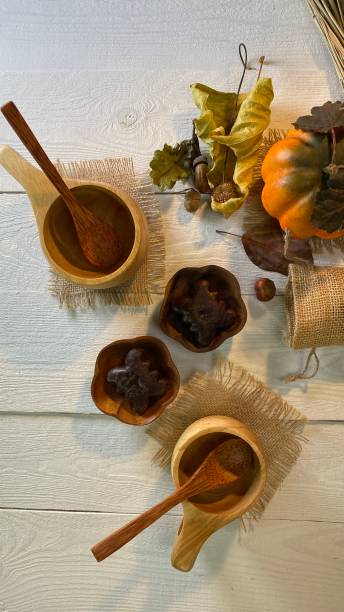 istock On a wooden table painted white there are cups for gingerbread coffee 1350473994