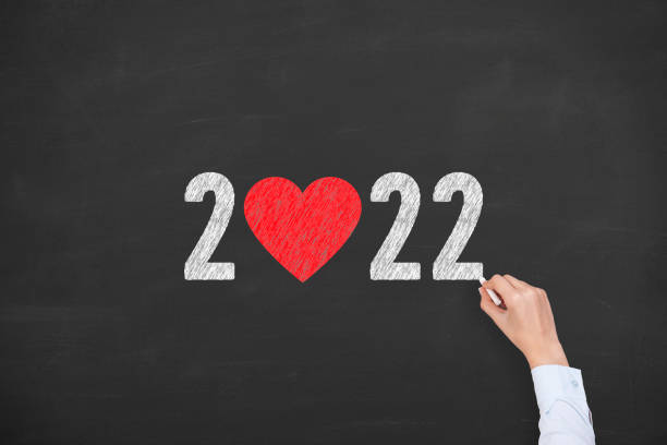 istock New Year 2022 with Heart Shape on Chalkboard Background 1350481847