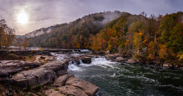 istock Panoramic Valley Falls on a misty autumn day 1350483374