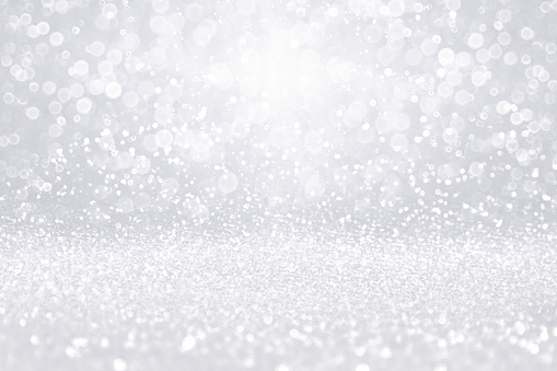 Silver white diamond jewelry background or Christmas snow glitter