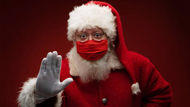 istock Santa Claus wearing protective mask 1350489525