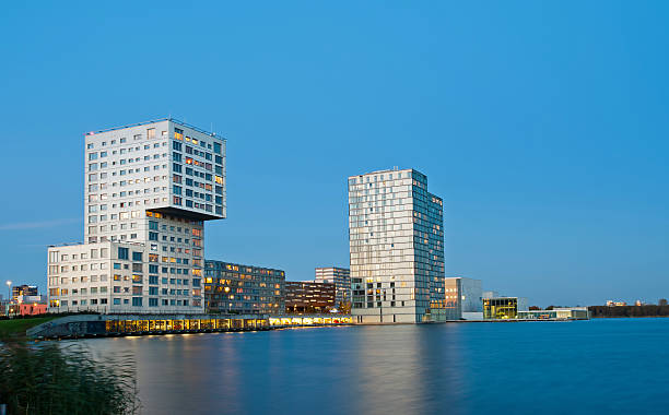istock Modern architecture on a lake at sunset 135049538