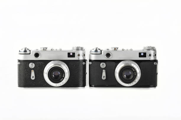 istock Old film rangefinder cameras produced from 50's on white background. 1350496168